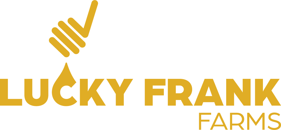 Logo of Lucky Frank Farms featuring a honey dipper and a droplet, representing quality honey products and sustainable farming practices.